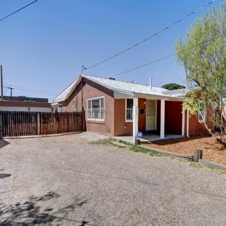 Rent this 3 bed house on Saint Therese Catholic School in 311 Shropshire Place Northwest, Albuquerque