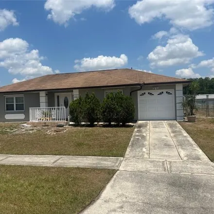 Rent this 3 bed house on 350 Buttonwood Drive in Buenaventura Lakes, FL 34743