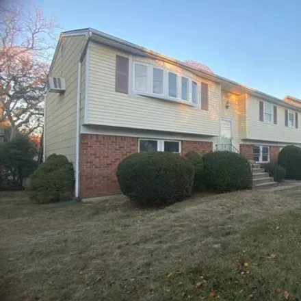 Rent this 3 bed house on 315 Starke Ave in East Meadow, New York