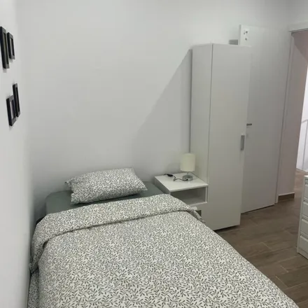 Rent this 8 bed room on Rua Carvalho Araújo 1 in 1885-020 Loures, Portugal