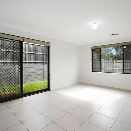Rent this 4 bed apartment on Keith Street in Middleton Grange NSW 2171, Australia