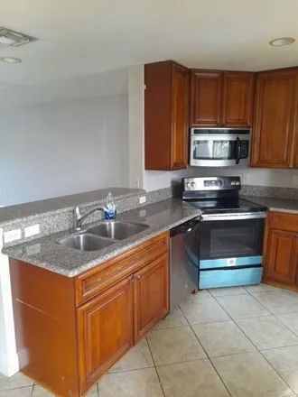 Rent this 2 bed house on 4902 Cambridge Street in Greenacres, FL 33463