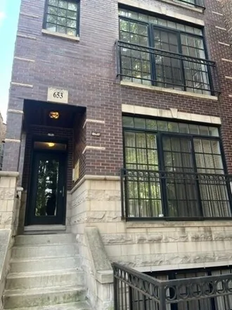 Rent this 3 bed condo on 653 W Belmont Ave Apt 1 in Chicago, Illinois