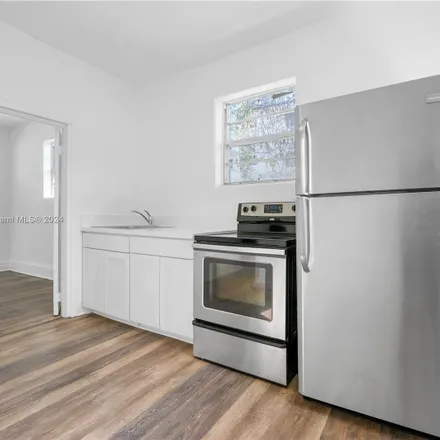 Rent this 4 bed apartment on 526 Southwest 3rd Street