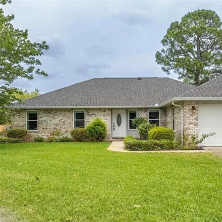 Buy this 4 bed house on 1642 Mauna Kea Ct in Gulf Breeze, Florida