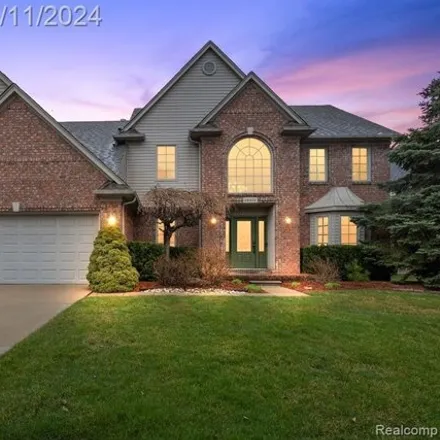 Buy this 4 bed house on 48450 Stoneacre Drive in Macomb Township, MI 48044