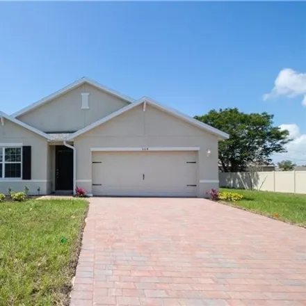Rent this 4 bed house on 513 NW 5th St in Cape Coral, Florida