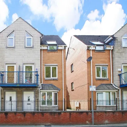 Rent this 4 bed townhouse on 11 Dearden Street in Manchester, M15 5LZ