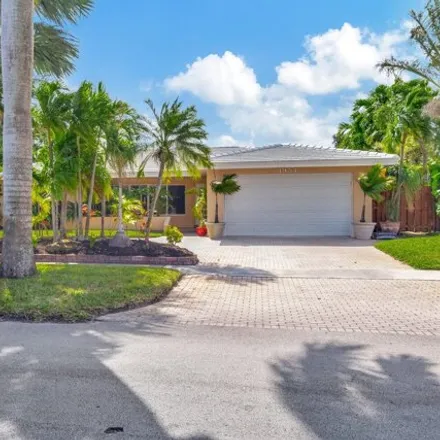 Buy this 4 bed house on 4954 Sarazen Drive in Hollywood, FL 33021