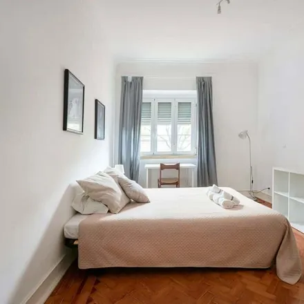 Rent this 7 bed room on Rua João de Menezes 13 in 1900-024 Lisbon, Portugal
