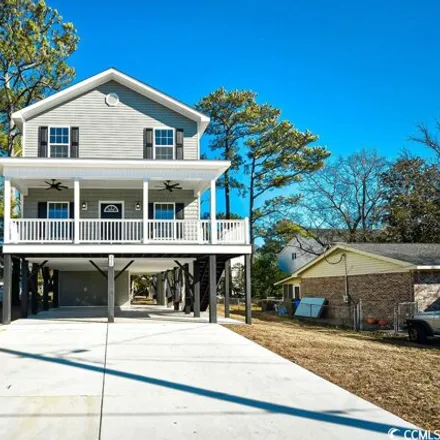 Buy this 4 bed house on 394 Melody Lane in Surfside Beach, Horry County