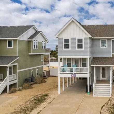 Buy this 4 bed house on Sutton Avenue in Kill Devil Hills, NC 27948