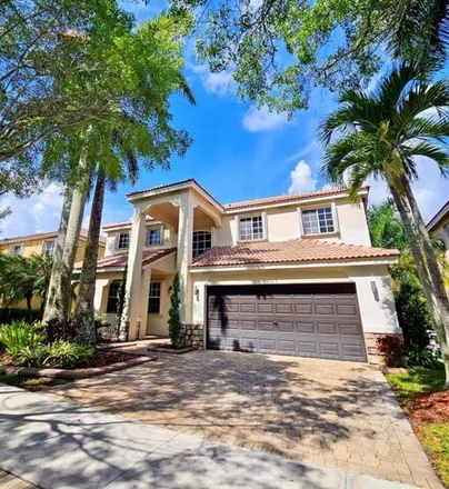 Rent this 4 bed house on 1325 Chenille Cir in Weston, Florida