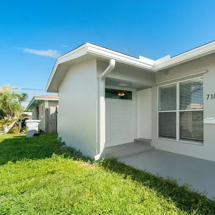 Rent this 2 bed townhouse on 710 Northeast 23rd Avenue in Harbor Village, Pompano Beach