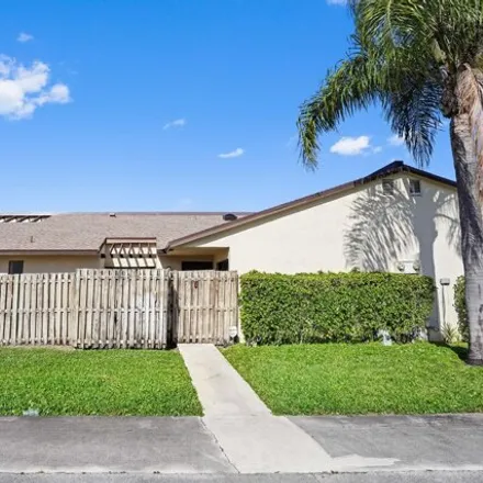 Buy this 3 bed house on 5012 Waterview Circle in Palm Springs, FL 33461
