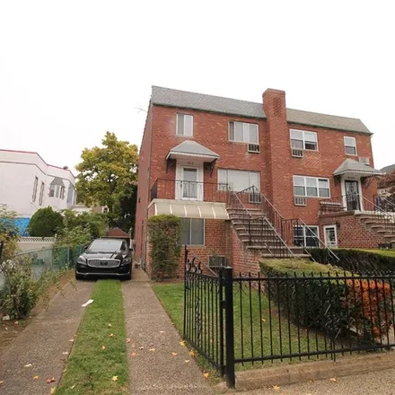 Buy this 5 bed townhouse on 2115 81st Street in New York, NY 11214