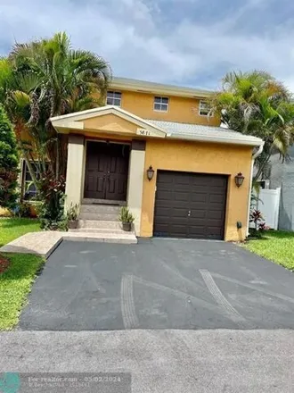 Image 1 - 5885 Woodland Point Drive, Tamarac, FL 33319, USA - House for rent