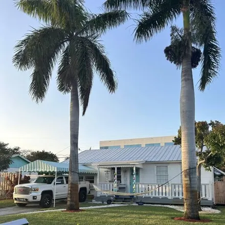 Buy this 2 bed house on 182 East 24th Street in Riviera Beach, FL 33404