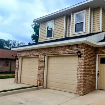 Rent this 3 bed house on 1619 Ash Crescent Street in Fort Worth, TX 76104