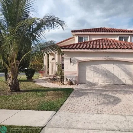 Buy this 4 bed house on 7569 Parkside Ln in Pompano Beach, Florida