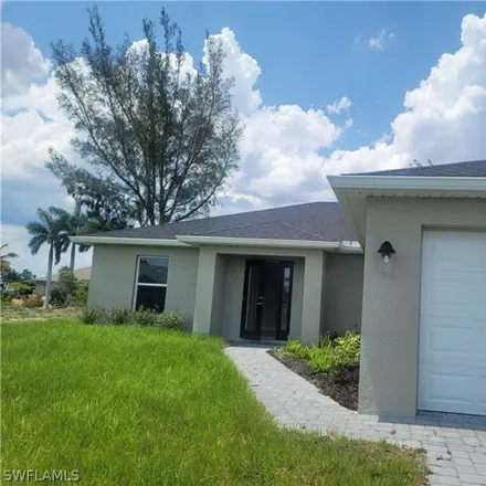 Rent this 4 bed house on 1729 NW 20th Ter in Cape Coral, Florida