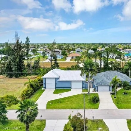 Buy this 4 bed house on 4322 Northeast 23rd Place in Cape Coral, FL 33909