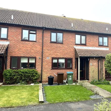Rent this 2 bed townhouse on Dinsdale Gardens in Rustington, BN16 3NH