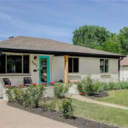 Buy this 4 bed house on 6999 West 32nd Avenue in Wheat Ridge, CO 80033