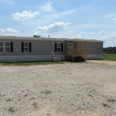 Rent this 3 bed house on 1668 Fm 2518 Rd Lot 30 in Cleveland, Texas