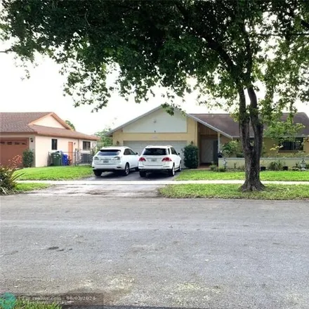 Buy this 3 bed house on 2311 NW 101st Ter in Pembroke Pines, Florida