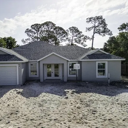 Buy this 4 bed house on 5418 Birch Drive in Indian River Estates, Saint Lucie County