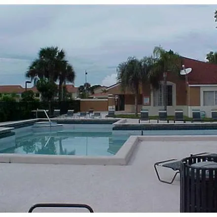 Rent this 2 bed apartment on 1141 Lake Victoria Drive in Golden Lakes, Palm Beach County