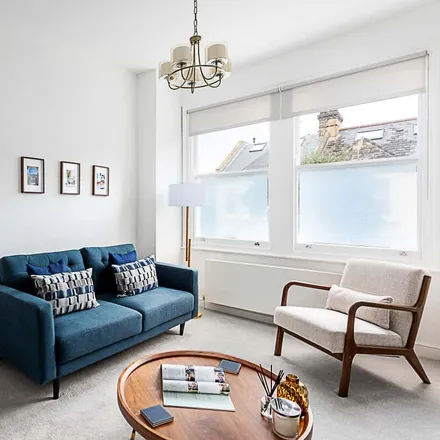 Rent this 2 bed townhouse on Cathles Road in London, SW12 9LF