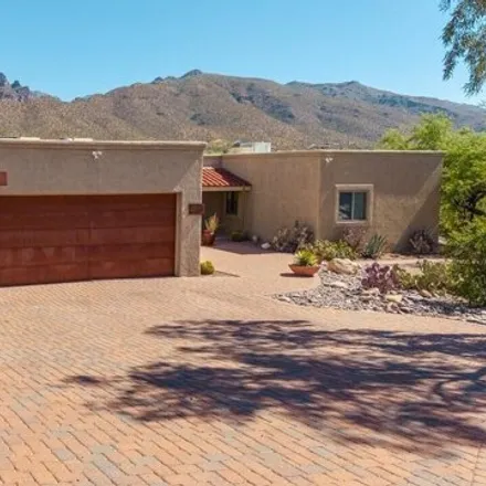 Buy this 4 bed house on 9022 East Bears Circle Drive in Pima County, AZ 85749