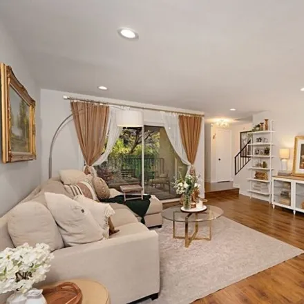 Buy this 2 bed townhouse on 7775 East Cabrini Drive in Los Angeles, CA 91504