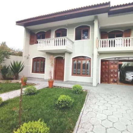 Buy this 6 bed house on Rua Vereador Washington Mansur 222 in Ahú, Curitiba - PR