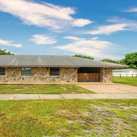Buy this 3 bed house on 306 East Fee Avenue in Melbourne, FL 32901