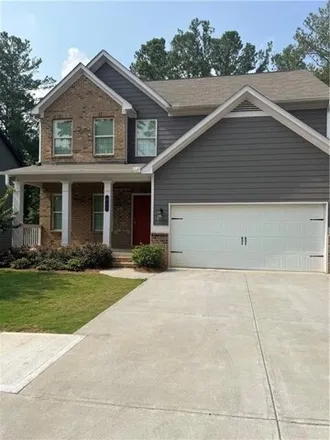 Rent this 4 bed house on 225 Dogwood Knoll Drive in Holly Springs, GA 30115