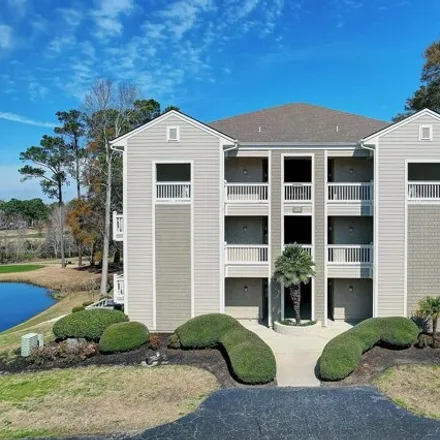 Buy this 2 bed condo on Clubhouse Road in Sunset Beach, Brunswick County
