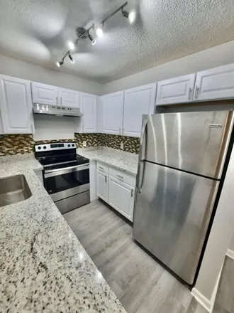 Rent this 2 bed condo on 454 Glenwood Drive in Palm Beach County, FL 33415