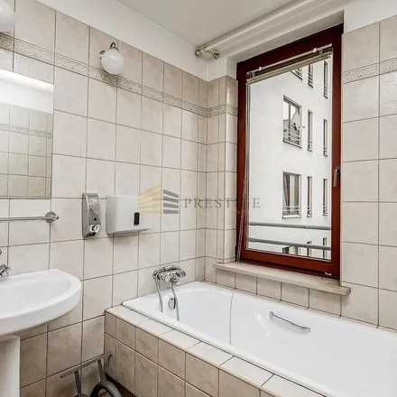 Rent this 4 bed apartment on Aleja "Solidarności" 117 in 00-140 Warsaw, Poland