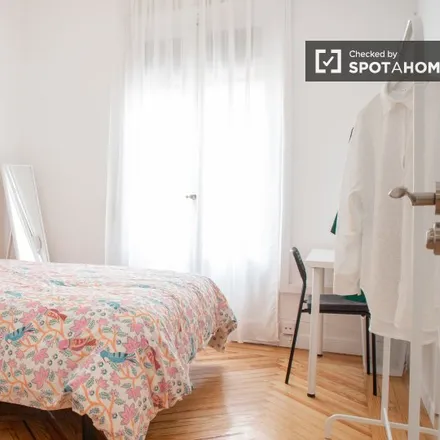 Rent this 5 bed room on Calle de la Virgen de los Peligros in 28013 Madrid, Spain