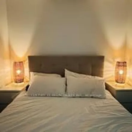 Rent this 1 bed apartment on Panda Condos in Lane W Yonge S Elm, Old Toronto