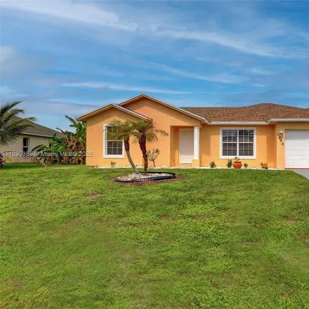 Buy this 3 bed house on 2906 Southwest Boxwood Circle in Port Saint Lucie, FL 34953