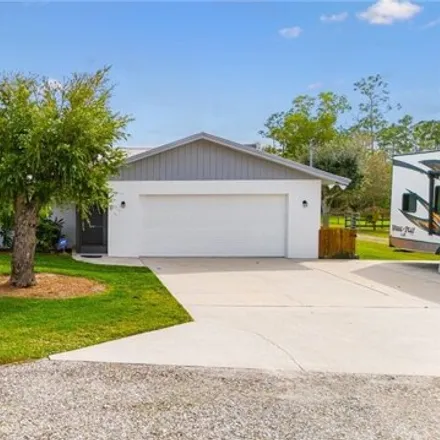 Buy this 3 bed house on 8254 Dosonte Lane in Lee County, FL 33917