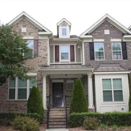 Rent this 4 bed townhouse on Stone Creek Village in 1027 Valleystone Drive, Cary