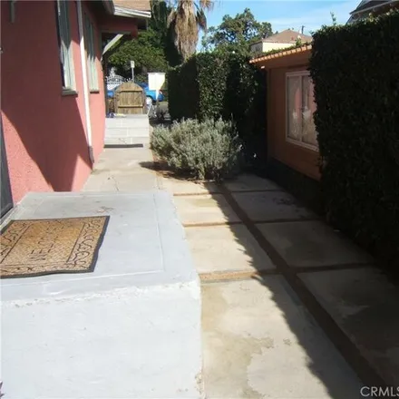 Buy this 6 bed house on 1242 West 35th Place in Los Angeles, CA 90007