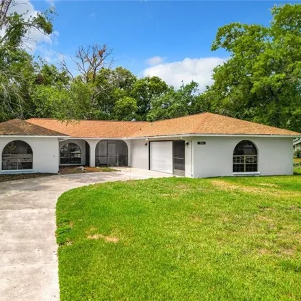 Buy this 3 bed house on 1218 Dion Lane in Spring Hill, FL 34608