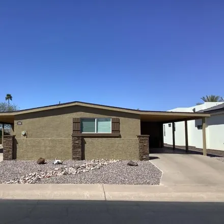 Buy this studio apartment on 2252 North Nicklaus Drive in Mesa, AZ 85215