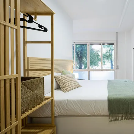 Rent this 6 bed room on Plaza del Conde del Valle de Suchil in 12, 28015 Madrid